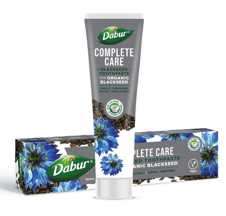 Паста за зъби за комплексна грижа с био Черен кимион 100 мл - Dabur с антибактериални свойства, съдържаща въглен и масло от чаено дърво.