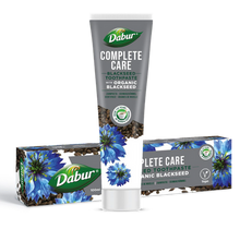 Паста за зъби за комплексна грижа с био Черен кимион 100 мл - Dabur с антибактериални свойства, съдържаща въглен и масло от чаено дърво.